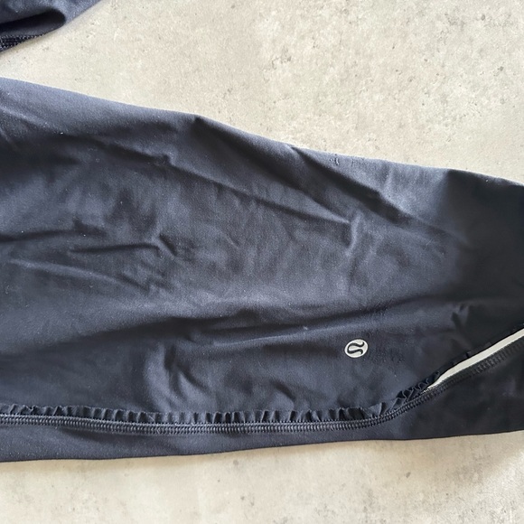 Lululemon Pink and Black Athletic Leggings with Stretchy Fabric - Picture 6 of 9